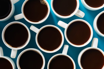 Overhead view of cups with black coffee