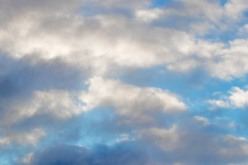 Naklejka na ściany i meble Blue sky with colorful storm clouds, background for design_