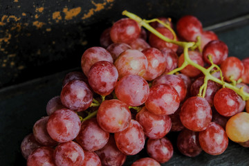 Bunch of pink muscat grapes.
