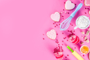 Valentine day cooking baking background. Utensils and ingredient for sweet Valentine cakes and...