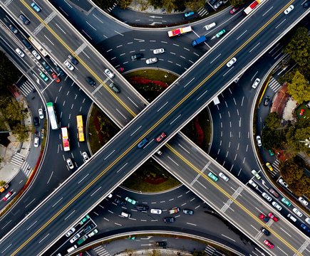 Aerial view of cars driving on elevated highway