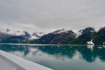 Fototapeta na wymiar Beautiful views of mountains and teal water while Cruising Glacier Bay Alaska