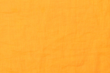 close up orange cotton fabric background