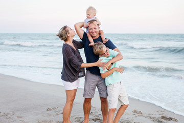 family on vacation at the beach