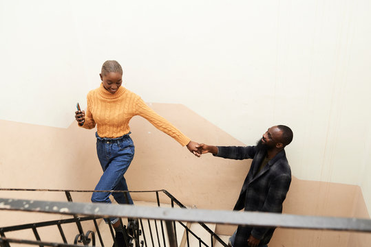 Playful ethnic couple.