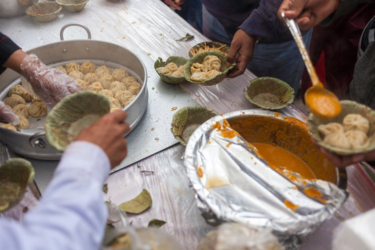 Selling dumplings (momos) during a food festival.