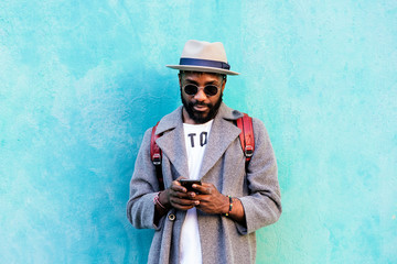 African man using mobile phone