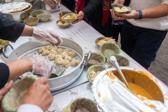 Selling dumplings (momos) during a food festival.