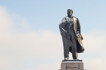 Ulyanovsk / Russia - 12 05 2019: Snow-covered Statue of Lenin against a blue sky in the city of Ulyanovsk, the former Simbirsk, the birthplace of Vladimir Ilyich Lenin.