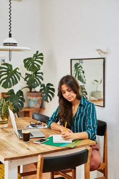 young designer woman working at home