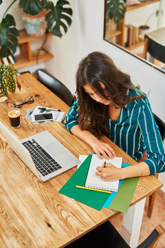 young designer woman working at home