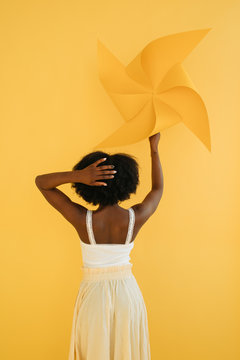 Anonymous black woman with pinwheel