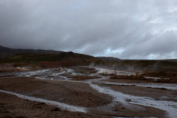 The original geysir in Iceland on a cloudy day