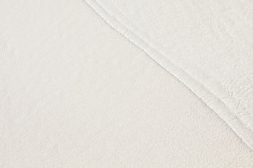 Beach sand under clear water background