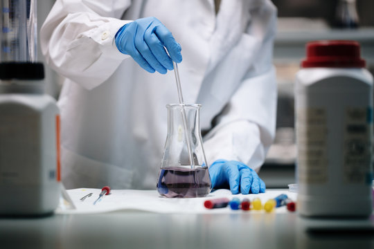young woman doing chemical experiments