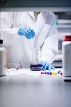 young woman doing chemical experiments