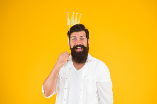 wow what a surprise. happy birthday. hipster booth props yellow background. ready for fun. bearded man party crown. king of party. royal style. brutal bearded man king. Costume party