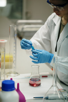 young woman doing chemical experiments
