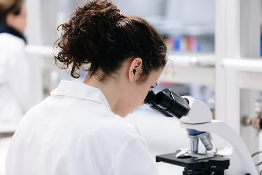 young woman doing chemical experiments