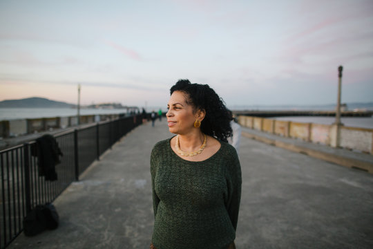 Thoughtful, Happy Mature Woman Outside.