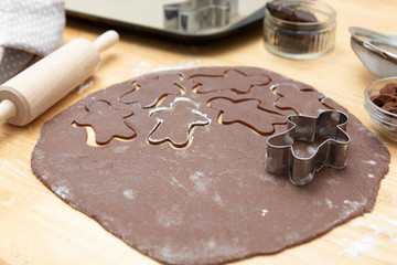 Top view of cooking process, festive Christmas gingerbread chocolate cookies. Cooking chocolate cookies or dessert.