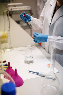 young woman doing chemical experiments