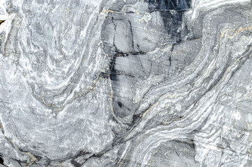 Texture of white and gray marble. Rough stone surface. Monochrome background.Marble wall.