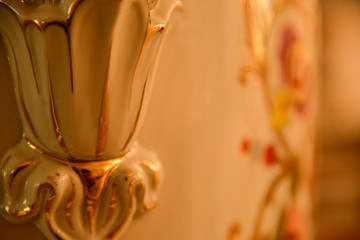 Details of ceramic decoration in blurred background