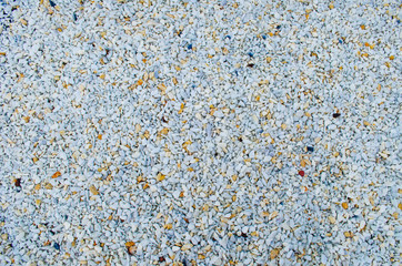 White stones. Texture of marble chips. Background of gravel.