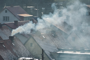 Sezon grzewczy w mieście - obrazy, fototapety, plakaty