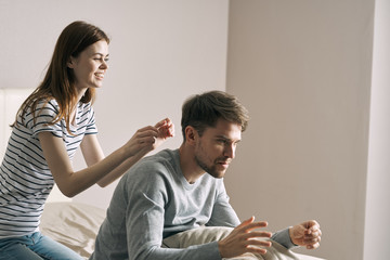 young couple having breakfast in bed