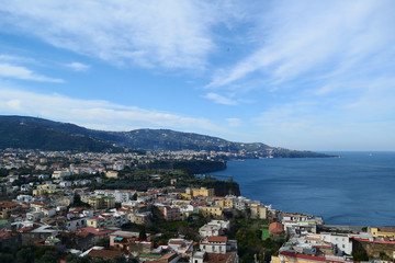 Naklejka na ściany i meble Daylight aerial view of cliff coastline Sorrento and Gulf of Naples in Southern Italy.