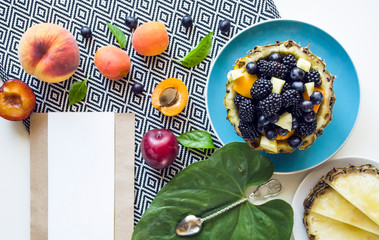 Creative  layout  of a Yummy dessert made from fresh summer fruits and berries on the table. 