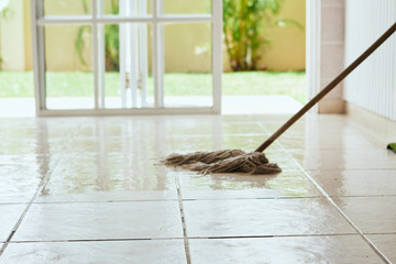 cleaning the floor with mop