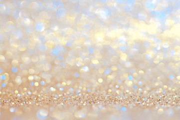 Colorful bokeh gold,yellow,blue abstract shining lights,sparkling glittering Valentines day,women...