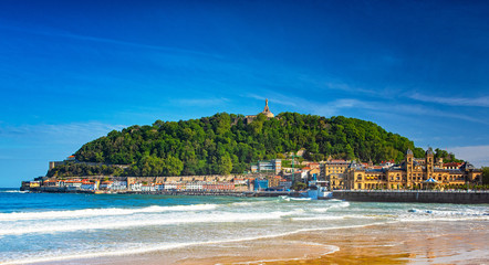 Nice beach with the old town of San Sebastian, Spain