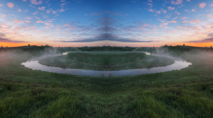 spring river. picturesque foggy sunrise. fog over the river