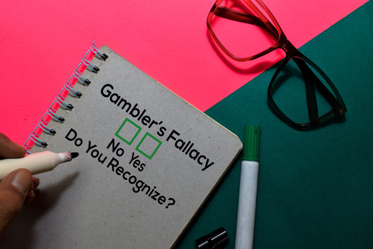 Gamblers Fallacy, Do You Rezognize? Yes Or No. On Office Desk Background