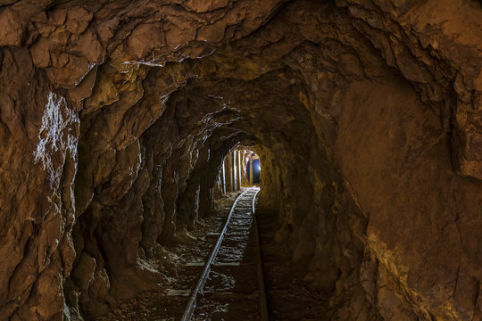 New Zealand, North Island, Waikato, railroad track in mine