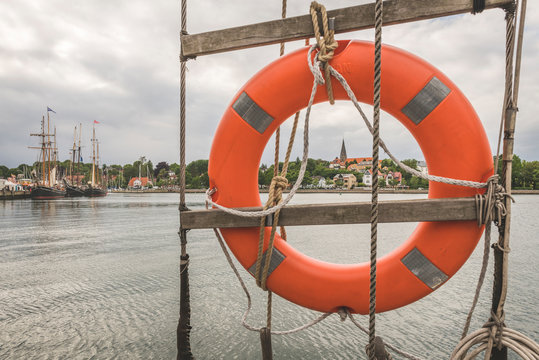 Germany, Schleswig-Holstein, Eckernforde, Church in Borby district seen through lifebuoy