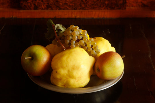 Still life with quinces, apples and grapes