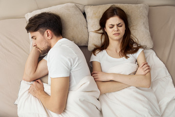 young couple in bed