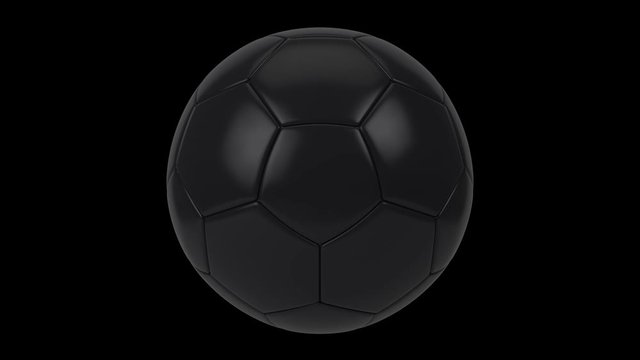 Realistic black soccer ball isolated on black background. 3d looping animation.