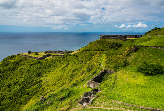 Scenic view of Brimstone hill fortress by sea against sky, St. Kitts and Nevis, Caribbean