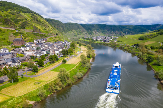 Aerial view of cruise ship on Mosel River against cloudy sky near Cochem, Germany