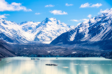 New Zealand, South Island, Scenic view of Tasman Lake and snowcapped mountains