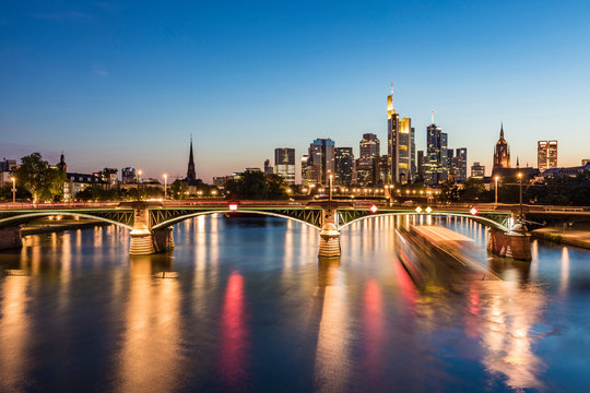 Illuminated Ignatz Bubis Bridge over River Main in Frankfurt, Germany