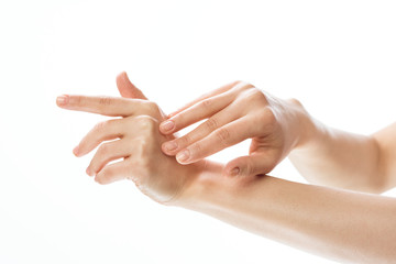 woman hands with french manicure isolated on white