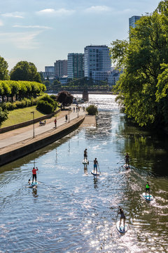 High Angle View Of People Paddleboarding On River In Frankfurt, Germany