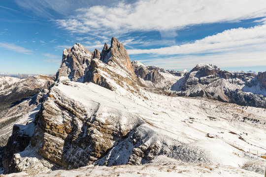 Scenic view of Seceda peak and mountains against sky during winter, Italy
